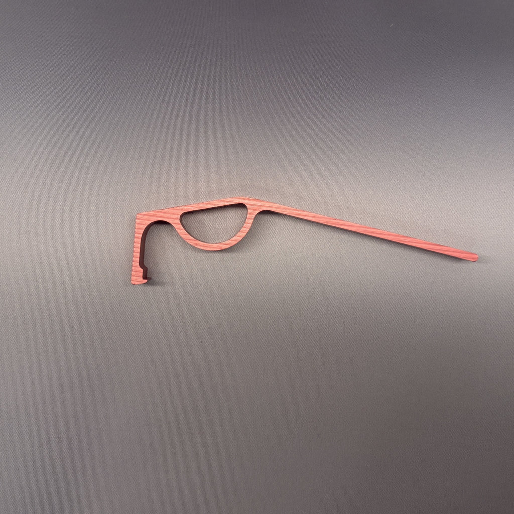 DCAPer medicine bottle opener in rose finish, flat lay